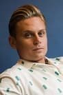 Billy Magnussen isLogan Ash