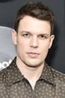 Jake Lacy isBrett Wyden