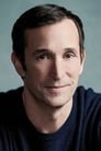 Noah Wyle isProf. Kenneth Monnitoff