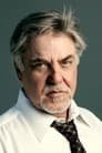 Bruce McGill isJudge Harkin