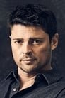 Karl Urban isWilliam Cooper