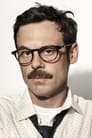 Scoot McNairy isAndrew Kaulder