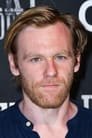 Brian Gleeson isDr. Robert Hardy